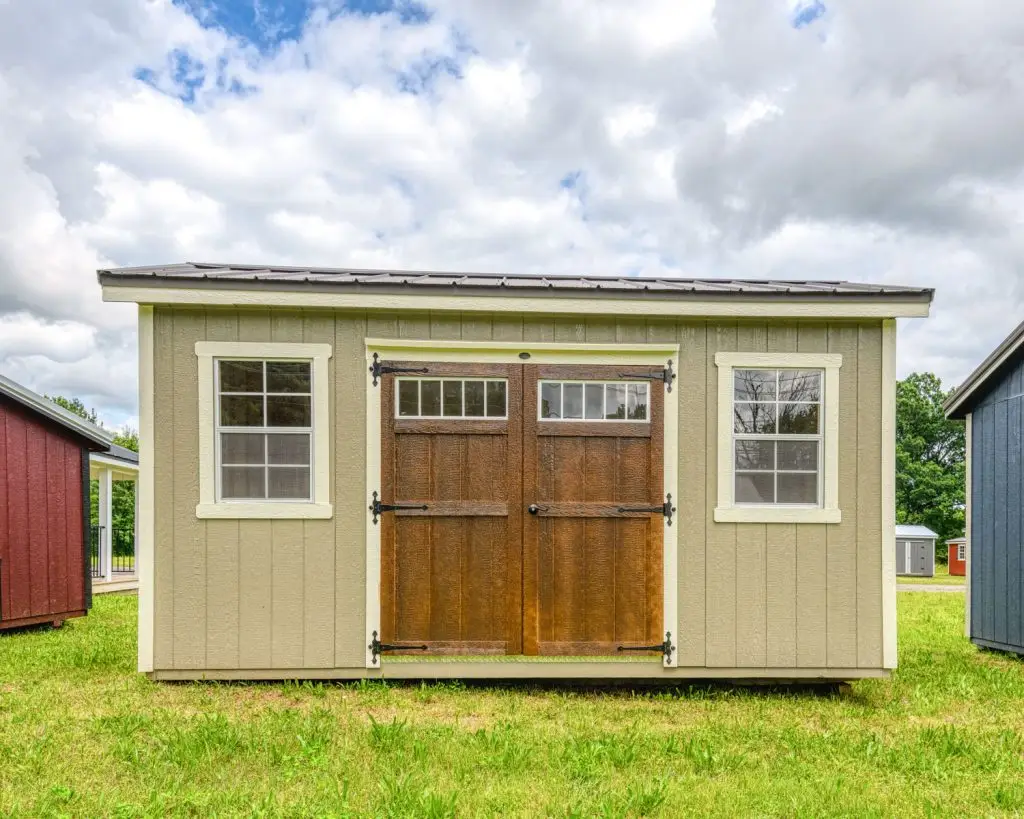 Tan Painted Cabin with two windows